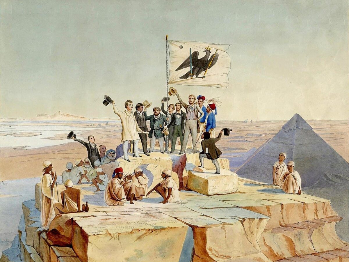 Lepsius' expedition waves the flag of Frederick William IV on top of the Great Pyramid for his birthday