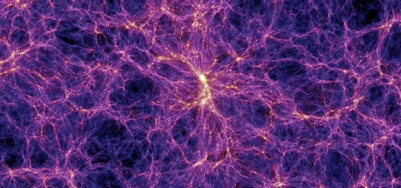 Simulation of the large-scale structure of the Universe. Dark matter is believed to be distributed as a mesh, as shown in this diagram. Clusters of galaxies form at "nodes" where many "threads" of dark matter intersect