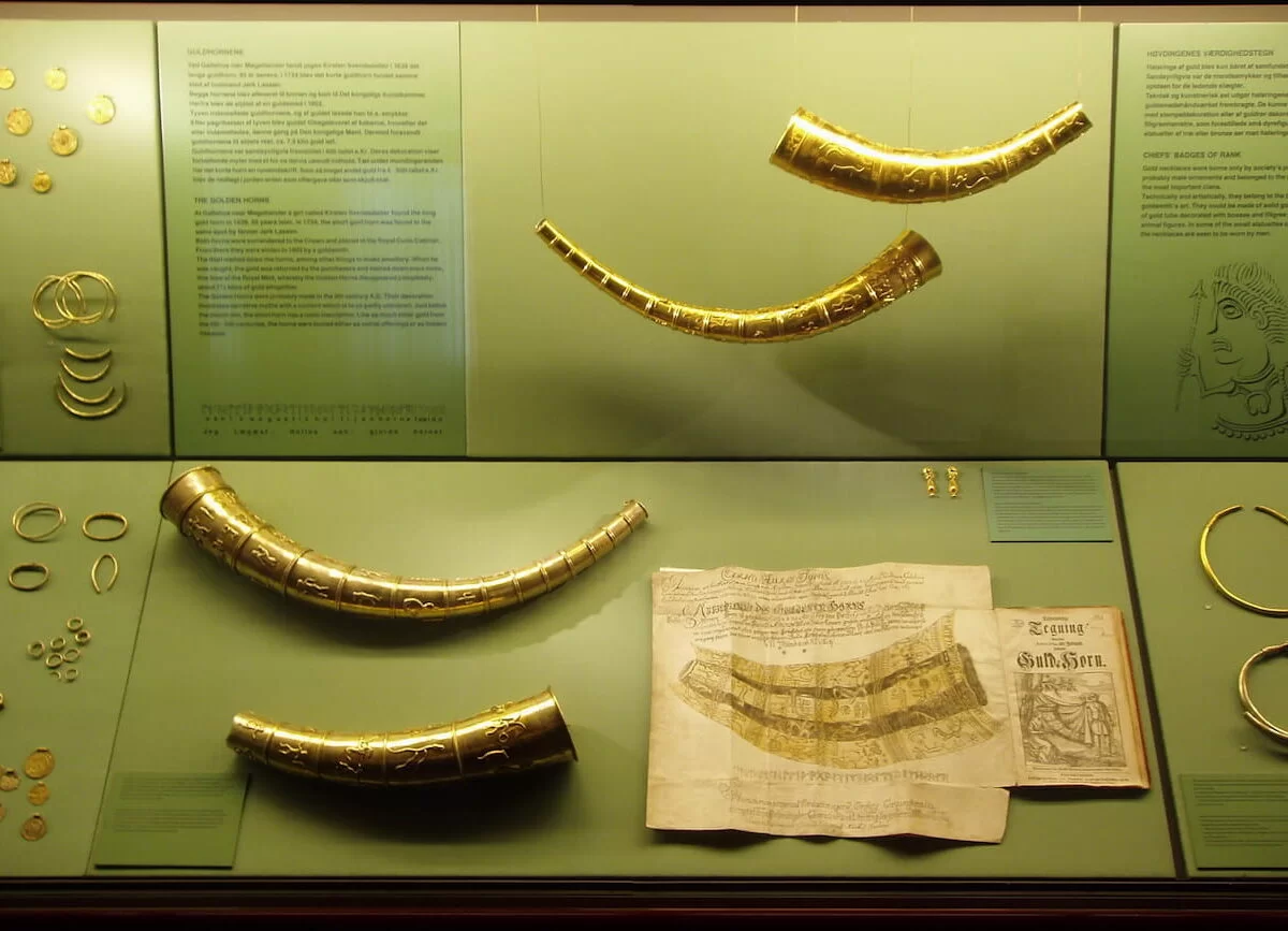 Two sets of reconstructions of the golden horns of Gallehus, on display in the National Museum of Denmark