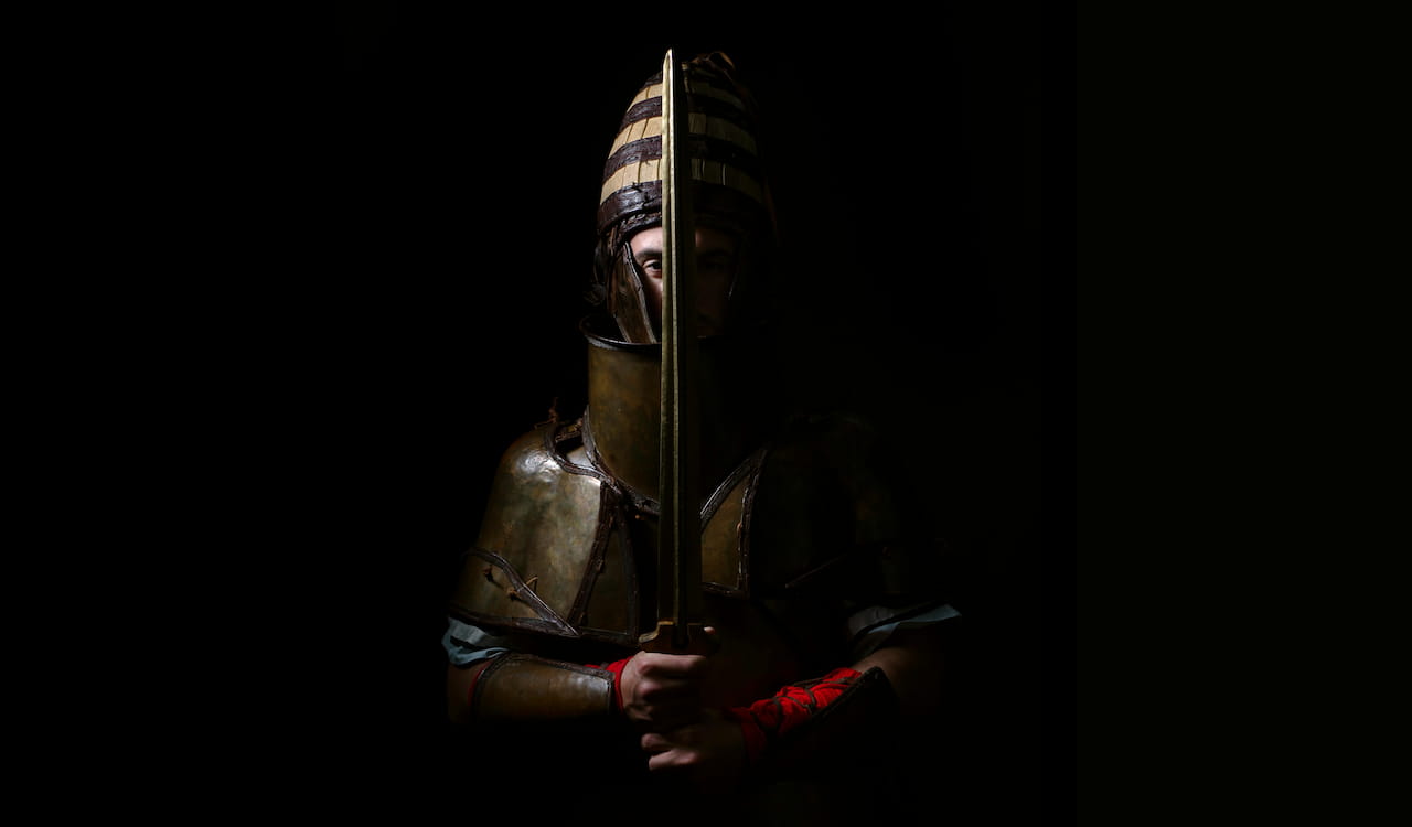 Artistic photo of the replica of the Dendra armor used in the studio.