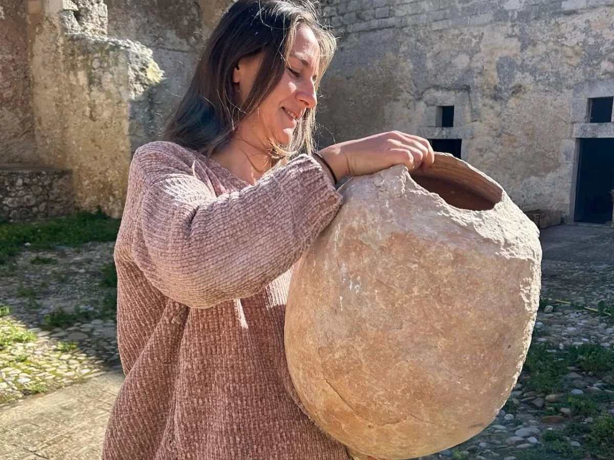 An Amphora Filled with Remains of Small Fish Found in the Excavations of the Ancient Greek City of Finziade in Sicily