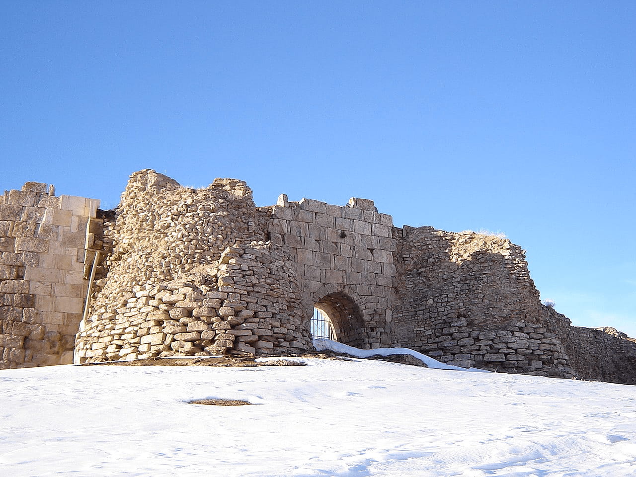 One of the gates of the wall of Takht-e Soleymān still preserved