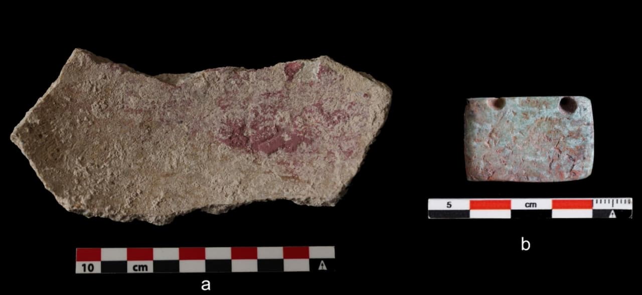 Cinnabar found on artifacts from Ucanal, Guatemala: (a) crushed cinnabar pigment on the interior of a utilitarian ceramic vessel (Cambio Unslipped type) and likely as a receptacle for pigment preparation, it was recovered intermixed with materials from a Late Classic bone tool production workshop in elite residential Group J (UCA1B-12-8-1322); (b) jade ornament (UC-PV-042) from a royal burial deposit, Burial 20-1 