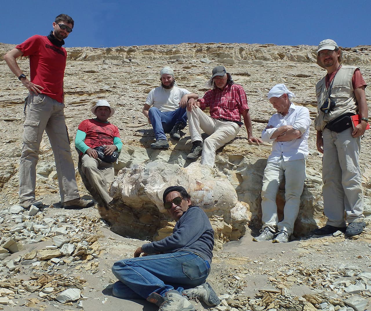 Archaeologists and paleontologists at the site of the find.