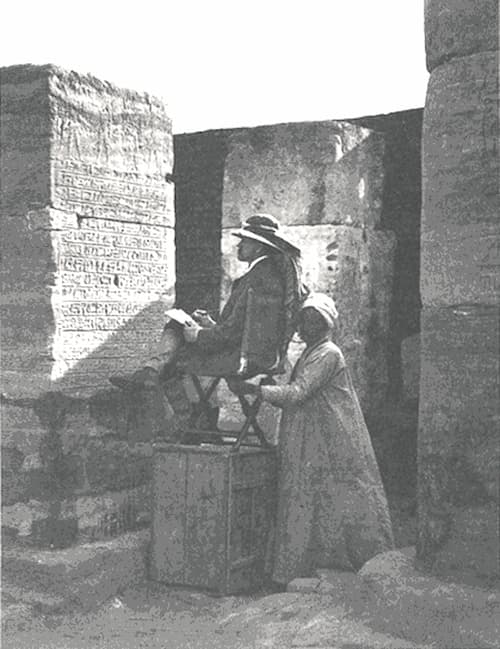 James Henry Breasted copying a hieroglyphic text in the temple of Buhen, Egypt.